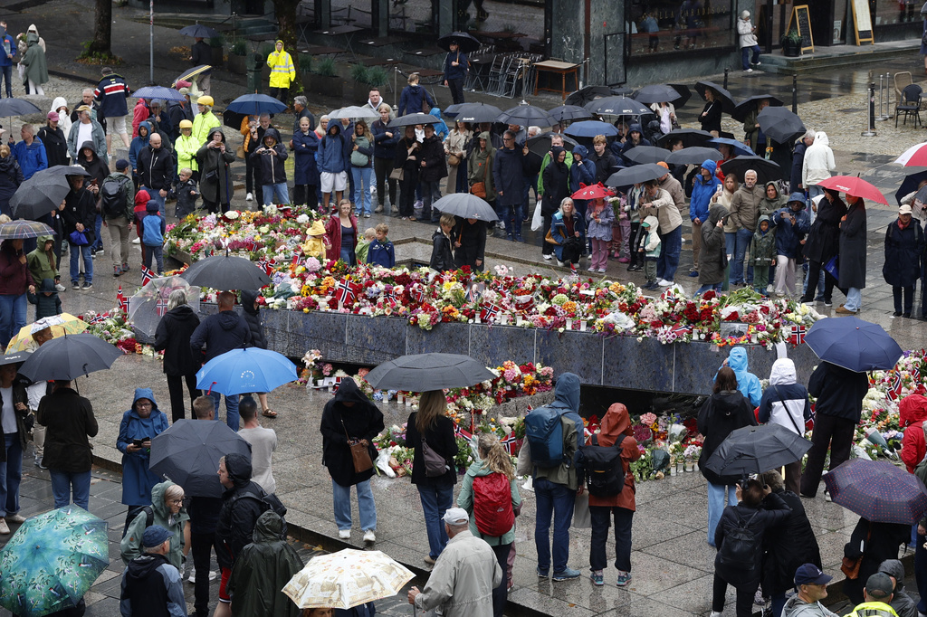Flowers and cards laid at the Blue Stone in Bergen for Norway’s King Harald V on Saturday, Aug. 29, 2026. (Silje Katrine Robinson /NTB Scanpix via AP)