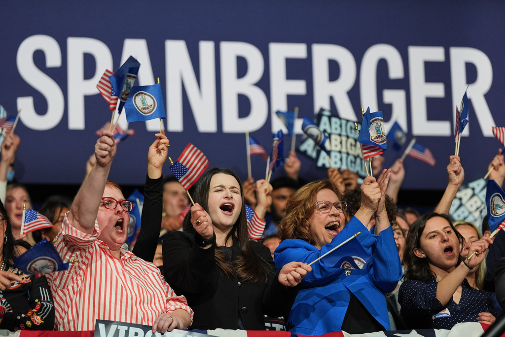 People cheer as Democrat Abigail Spanberger speaks on stage after she was declared the winner of the Virginia governor's race during an election night watch party Tuesday, Nov. 4, 2025, in Richmond, Va. (AP Photo/Stephanie Scarbrough)