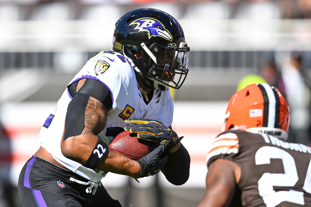 Baltimore Ravens running back Derrick Henry (22) runs the ball against the Cleveland Browns during the first half of an NFL football game in Cleveland, Sunday, Oct. 18, 2026. (AP Photo/David Richard)