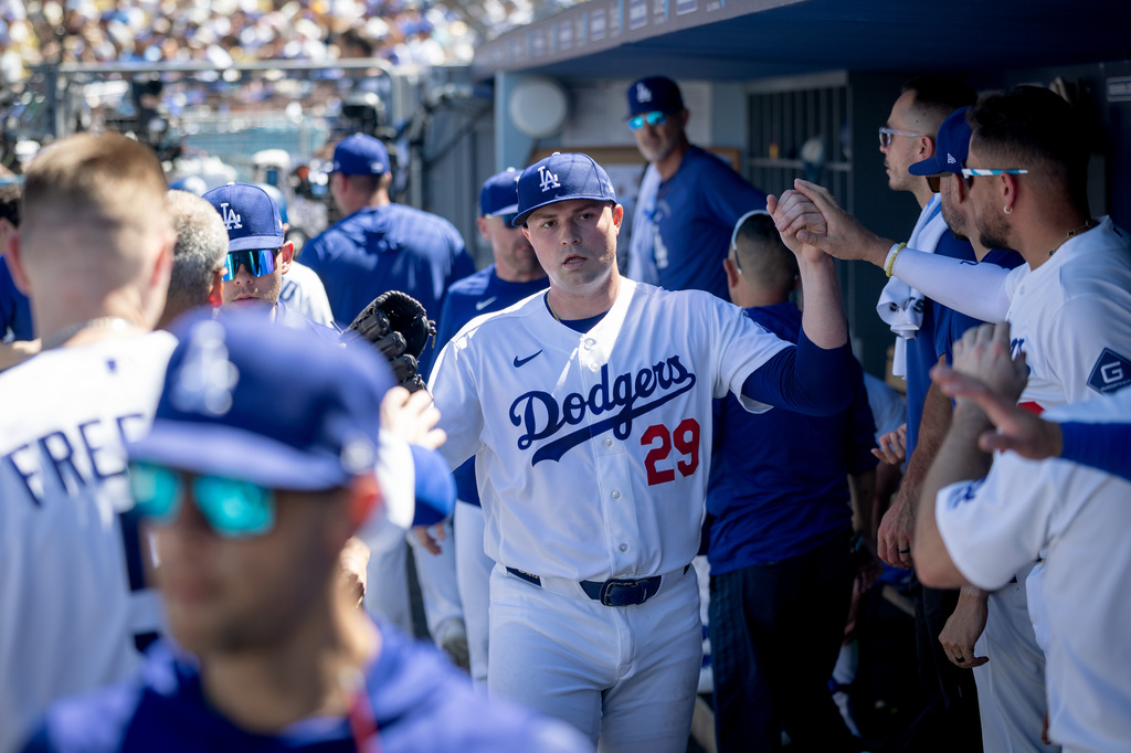 Los Angeles Dodgers pitcher Tarik Skubal (29) celebrates with teammates during the sixth inning of a baseball game against the Milwaukee Brewers, Sunday, Aug. 16, 2026, in Los Angeles. (Eric Thayer/Los Angeles Times via AP)