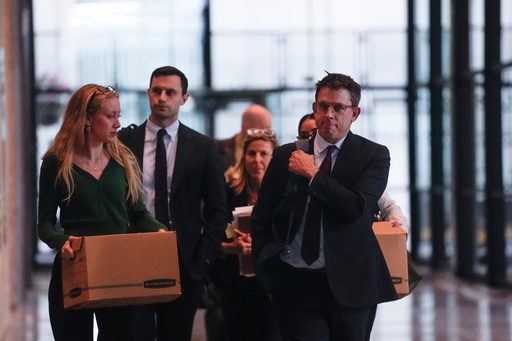 Attorney Steve Art of civil rights law firm Loevy and Loevy, right, part of the legal team for the plaintiffs, leaves the Dirksen Federal Courthouse after a hearing held by U.S. District Judge Sara Ellis to learn more about tactics used in the Trump administration's immigration crackdown, Monday, Oct. 20, 2025, in Chicago. (AP Photo/Erin Hooley) Attorney Steve Art of civil rights law firm Loevy and Loevy, right, part of the legal team for the plaintiffs, leaves the Dirksen Federal Courthouse after a hearing held by U.S. District Judge Sara Ellis to learn more about tactics used in the Trump administration's immigration crackdown, Monday, Oct. 20, 2025, in Chicago. (AP Photo/Erin Hooley)