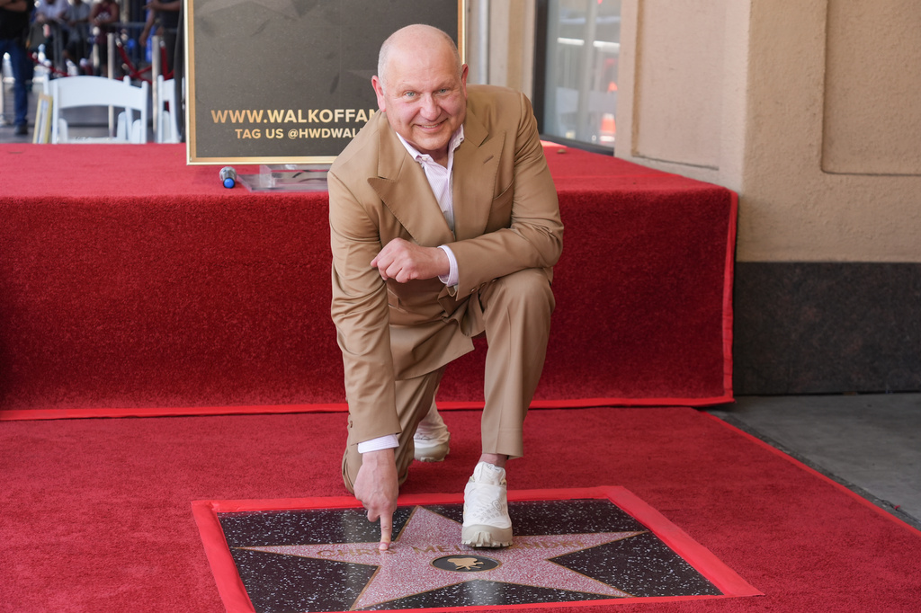 FILE - Chris Meledandri poses with his new star during a ceremony on the Hollywood Walk of Fame in Los Angeles on June 10, 2026. (AP Photo/Chris Pizzello, File)