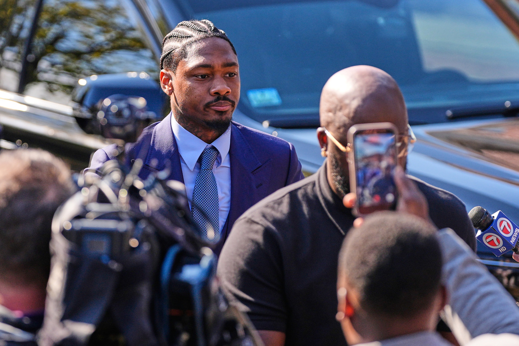 FILE - Former New England Patriots wide receiver Stefon Diggs arrives at Norfolk County District Court, May 4, 2026, in Dedham, Mass. (AP Photo/Charles Krupa, File)