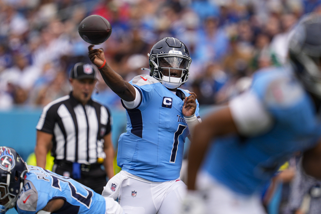 Tennessee Titans quarterback Cam Ward (1) throws against the Indianapolis Colts during the first half of an NFL football game Sunday, Sept. 21, 2025, in Nashville, Tenn. (AP Photo/George Walker IV)
