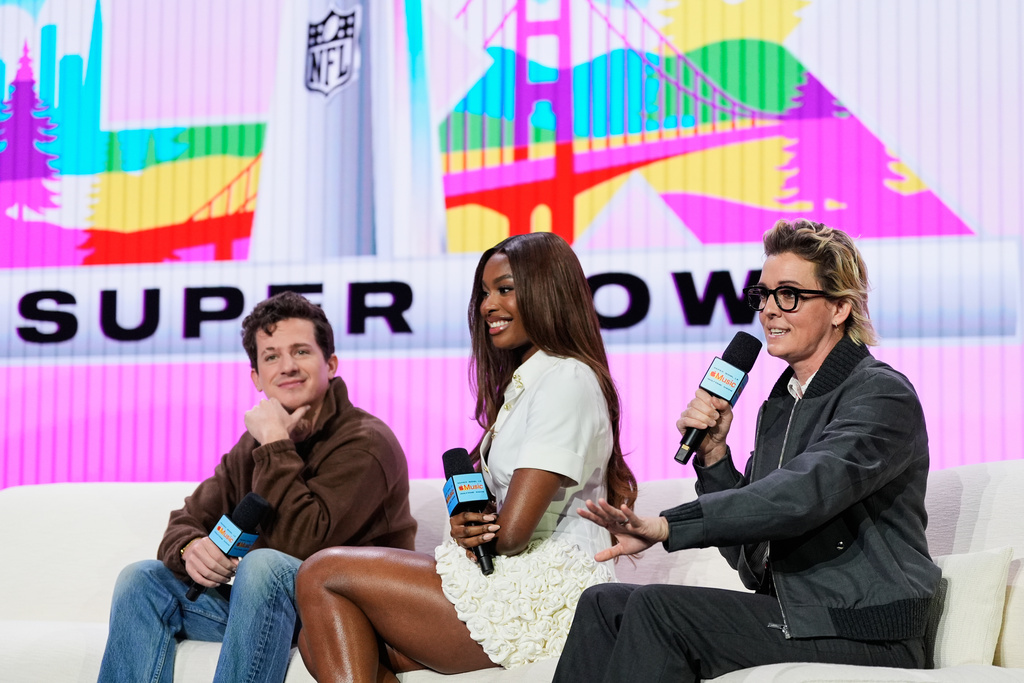 From left; Charlie Puth, Coco Jones and Brandi Carlile – who will perform the national anthem, "Lift Every Voice," and "America the Beautiful" respectively – speak during a news conference, Thursday, Feb. 5, 2026, in San Francisco ahead of the NFL Super Bowl 60 football game between the Seattle Seahawks and the New England Patriots. (AP Photo/Godofredo A. Vásquez)
