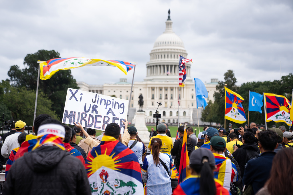 Pro-Tibet independence protestors demonstrate near the U.S. Capitol while China's President Xi Jinping visits the White House, Thursday, Sept. 24, 2026, in Washington. (AP Photo/Allison Robbert)