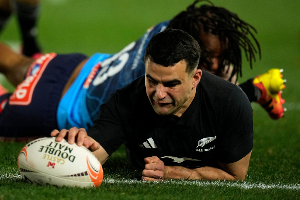 New Zealand's Josh Moorby scores a try during a rugby match between Bulls and New Zealand, in Pretoria, South Africa, Saturday, Aug. 15, 2026. (AP Photo/Themba Hadebe)