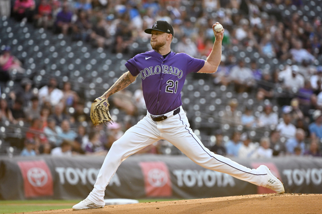 Colorado Rockies starting pitcher Kyle Freeland throws in the first inning of a baseball game against the Miami Marlins Wednesday, July 1, 2026, in Denver. (AP Photo/Geneva Heffernan)