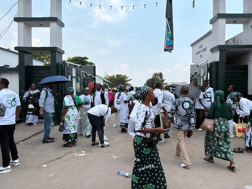 Kimbanguist Church members gather for Easter Sunday service at a reception center for the faithful in Kinshasa, Democratic Republic of the Congo, Sunday, April 5, 2026. (AP Photo/Rodney Muhumuza)