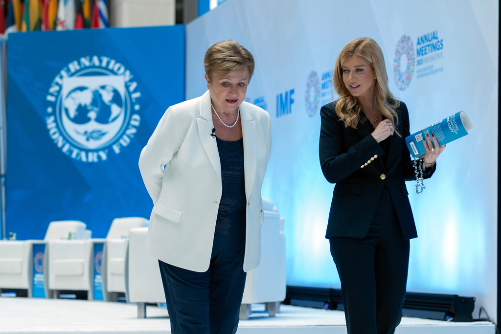 International Monetary Fund (IMF) Managing Director Kristalina Georgieva, left, walks with CNBC Financial News Anchor Sara Eisen after speaking in a conference during the World Bank/IMF Annual Meetings at the IMF headquarters in Washington, Tuesday, Oct. 14, 2025. (AP Photo/Jose Luis Magana)