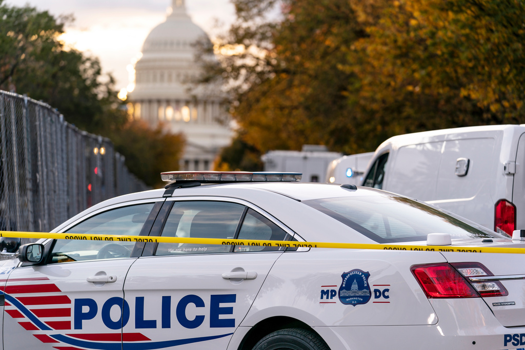 FILE - Washington Metropolitan Police investigate near the U.S. Capitol, Oct. 19, 2022, in Washington. (AP Photo/J. Scott Applewhite, File)