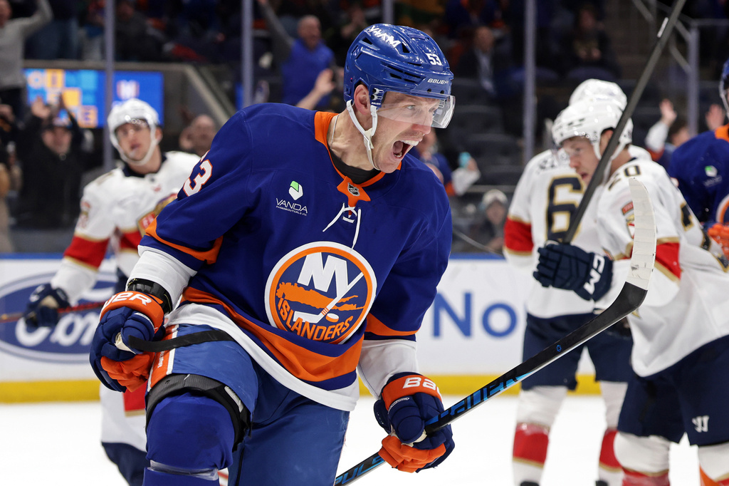 New York Islanders center Casey Cizikas reacts after scoring a goal in the second period of an NHL hockey game against the Florida Panthers, Saturday, March 28, 2026, in Elmont, N.Y. (AP Photo/Adam Hunger)