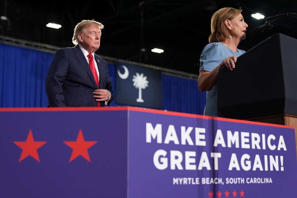 Sen. Darline Graham, R-S.C., speaks as President Donald Trump listens at a campaign rally for Graham at the Myrtle Beach Convention Center in Myrtle Beach, S.C., Friday, Aug. 21, 2026. (AP Photo/Jacquelyn Martin)
