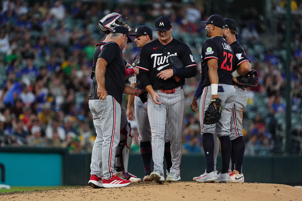 Minnesota Twins pitcher Connor Prielipp (61) walks off the mound after being pulled from the game in the sixth inning during a baseball game against the Athletics Wednesday, Aug. 26, 2026, in West Sacramento, Calif. (AP Photo/Alan Greth)