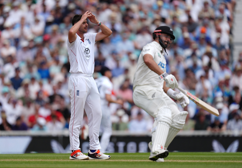 England's Josh Tongue reacts to a missed chance on day four of the Second Rothesay Test cricket match between England and New Zealand in London, England, Saturday, June 20, 2026. (Ben Whitley/PA via AP)