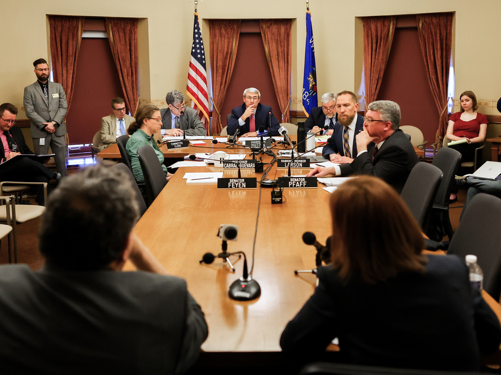 UW Board of Regents President Amy Bogost and Regent Timothy Nixon, close, are questioned at a hearing with the Wisconsin State Senate Committee on Education on Thursday, April 9, 2026 at the Wisconsin State Capitol in Madison, Wis. (Owen Ziliak/Wisconsin State Journal via AP)