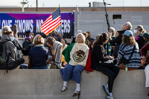 Heidi Rodriguez joins dozens of protesters near the U.S. Immigration and Customs Enforcement facility in Broadview, Ill., Friday, Oct. 17, 2025. (Ashlee Rezin /Chicago Sun-Times via AP) Heidi Rodriguez joins dozens of protesters near the U.S. Immigration and Customs Enforcement facility in Broadview, Ill., Friday, Oct. 17, 2025. (Ashlee Rezin /Chicago Sun-Times via AP)