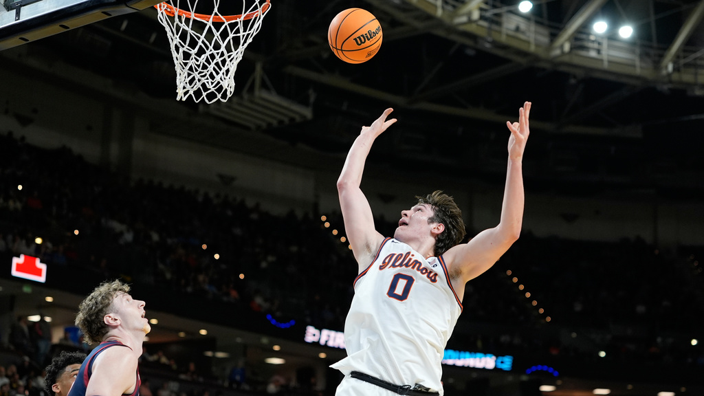 Illinois forward David Mirkovic (0) shoots during the first half in the first round of the NCAA college basketball tournament against Pennsylvania, Thursday, March 19, 2026, in Greenville, S.C. (AP Photo/Brynn Anderson)