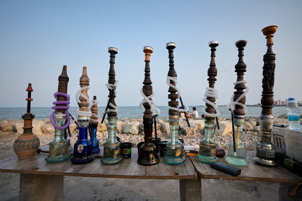 Water pipes are displayed along the corniche overlooking the Strait of Hormuz in Bandar Abbas, Iran, Sunday, Sept. 6, 2026. (AP Photo/Vahid Salemi)