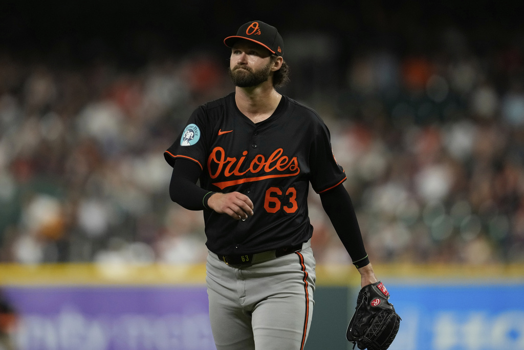 Baltimore Orioles starting pitcher Brandon Young returns to the dugout after the eighth inning of a baseball game against the Houston Astros in Houston, Friday, Aug. 15, 2025. (AP Photo/Ashley Landis)