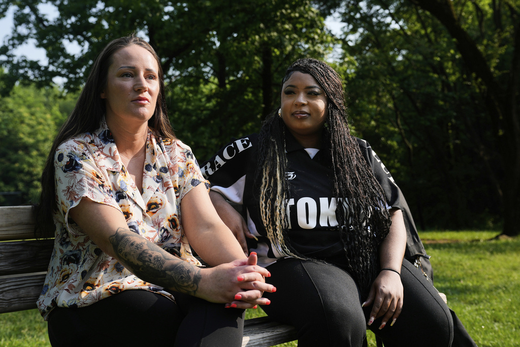 Case worker Sarah Boyle, left, who has worked with Maria Pires, and Britney Jones, Pires' most recent roommate before being deported to Brazil, give an interview in Glen Burnie, Maryland, Wednesday, June 11, 2025. (AP Photo/Stephanie Scarbrough)