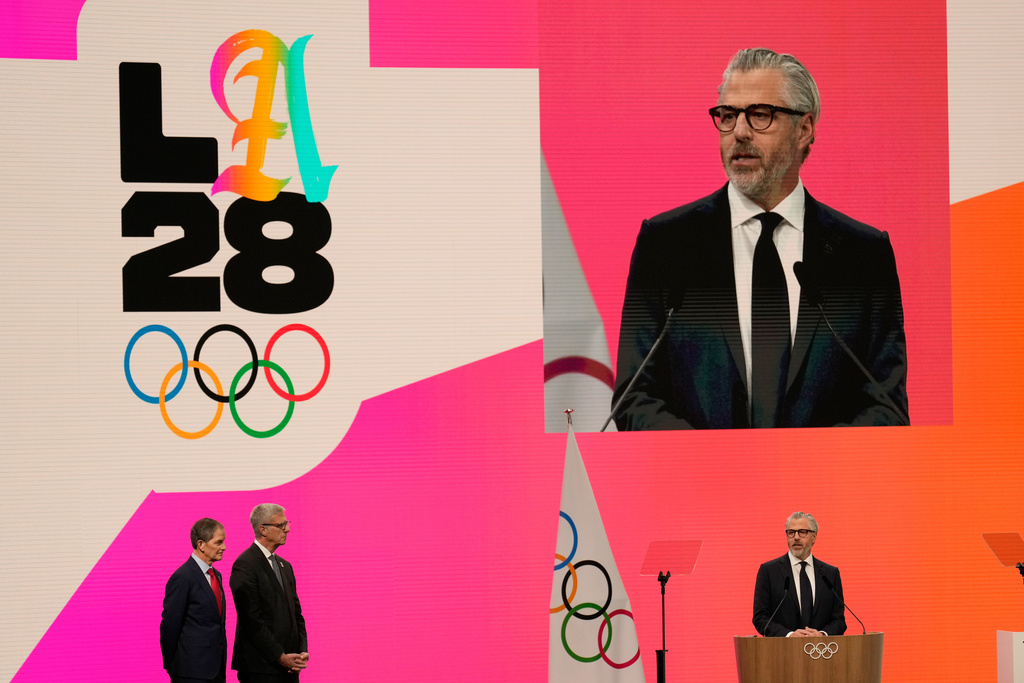 Casey Wasserman, Chairman of the Los Angeles Organizing Committee for the 2028 Olympic and Paralympic Games speaks during an IOC meeting ahead of the 2026 Winter Olympics, in Milan, Italy, Tuesday, Feb. 3, 2026. (AP Photo/Luca Bruno)