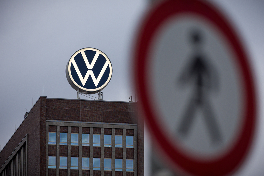 A view of a pedestrian traffic sign near to the Volkswagen brand skyscraper, in Wolfsburg, Germany, Friday, Sept. 4, 2026. (Moritz Frankenberg/dpa via AP)