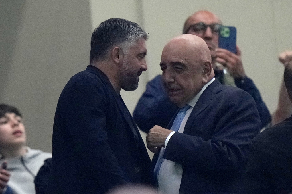 Italian entrepreneur and football executive Adriano Galliani, right, talks to Gennaro Gattuso before a Serie A soccer match between AC Milan and Bologna at San Siro stadium in Milan, Italy, Sunday, Sept. 14, 2025. (AP Photo/Luca Bruno)