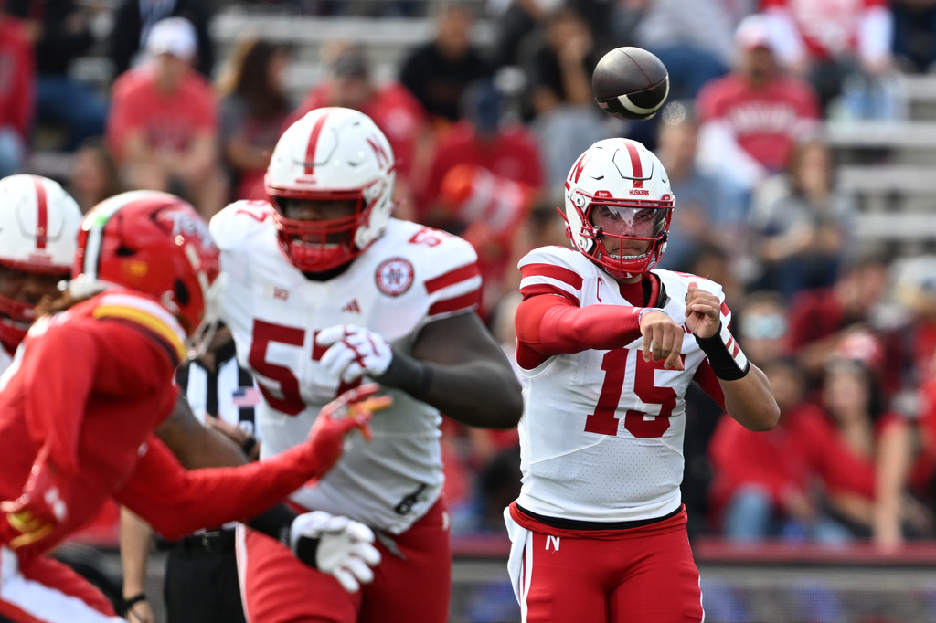 Nebraska quarterback Dylan Raiola (15) throws against Maryland during the first half of a NCAA college football game, Saturday, Oct. 11, 2025, in College Park, Md. (AP Photo/Gail Burton)