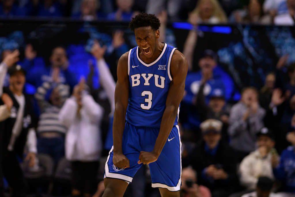 BYU forward AJ Dybantsa reacts to scoring a career high and new freshman record at BYU during the second half of an NCAA college basketball game against Utah, Saturday, Jan. 24, 2026, in Provo, Utah. (AP Photo/Tyler Tate)