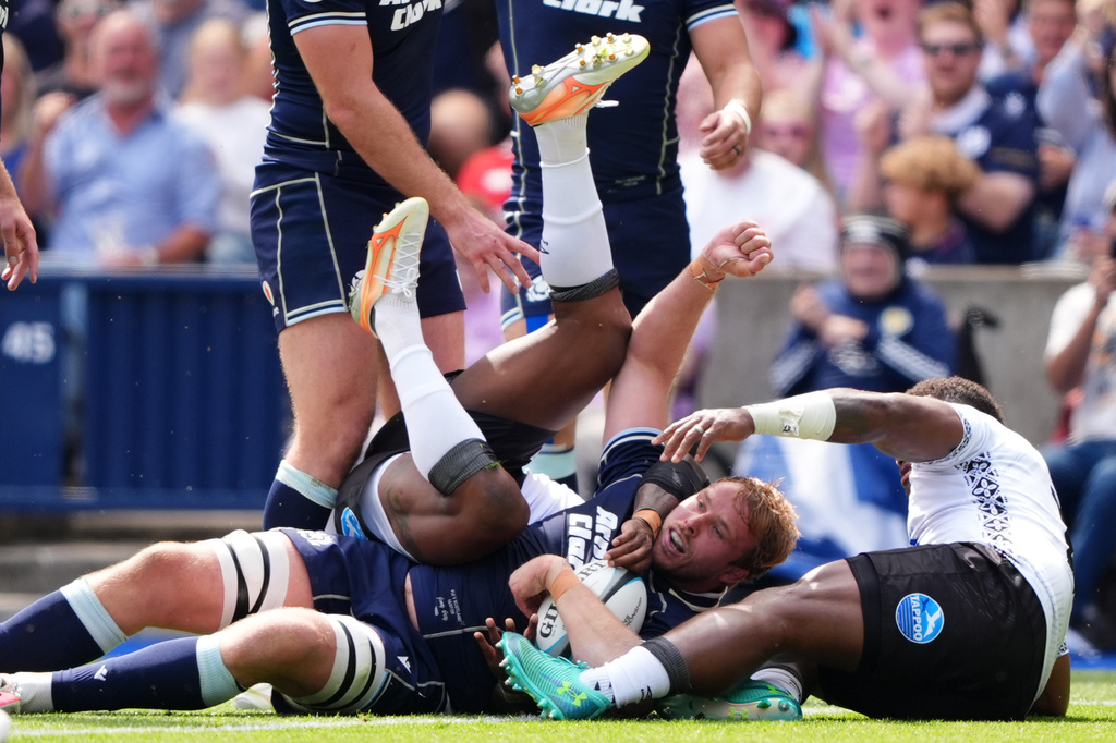 Scotland's Jonny Gray scores their side's first try of the game during the Nations Championship match between Scotland and Fiji, at Scottish Gas Murrayfield Stadium in Edinburgh, Scotland, Saturday July 18, 2026. (Andrew Milligan/PA via AP)