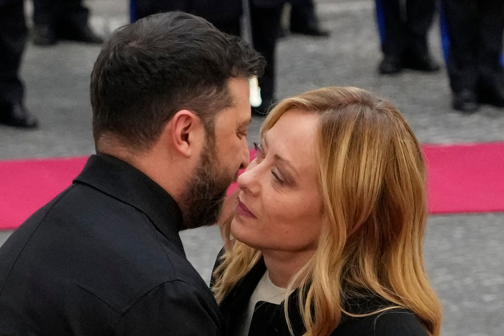 Ukraine's President Volodymyr Zelenskyy, left, is received at Chigi Palace by Italian Premier Giorgia Meloni, Tuesday, Dec. 9, 2025. (AP Photo/Gregorio Borgia)