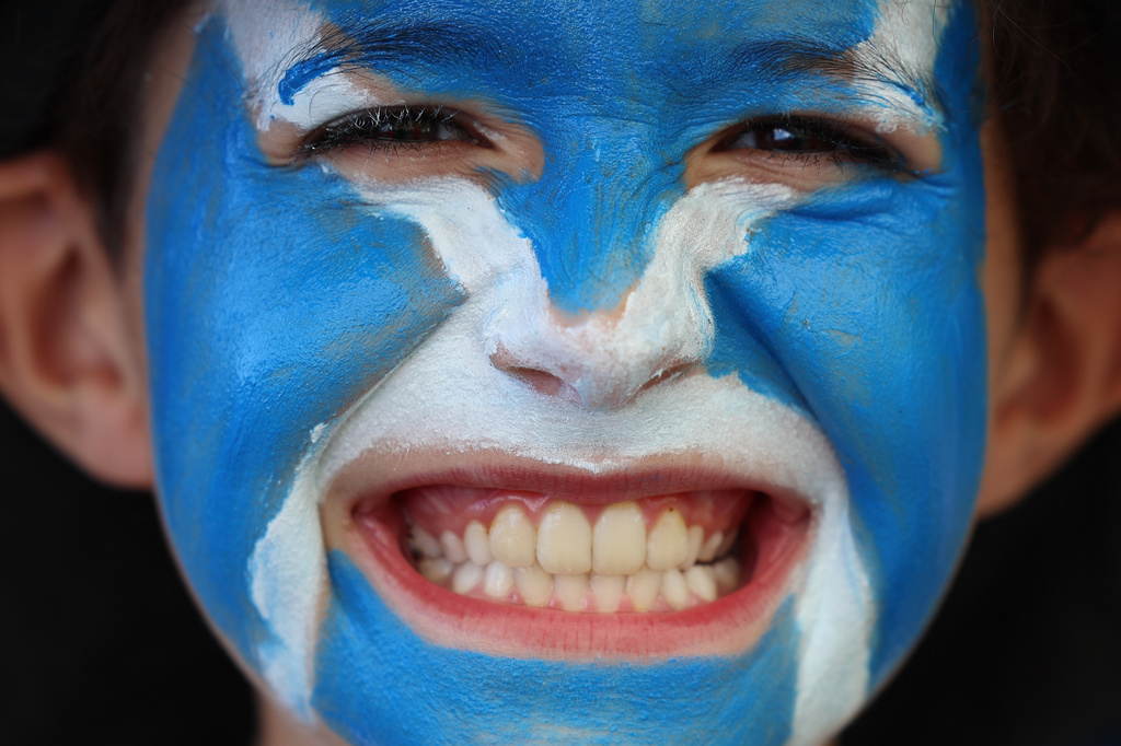 A young Scotland fan reacts ahead of the World Cup Group C soccer match between Scotland and Morocco in Foxborough, Mass., near Boston, Friday, June 19, 2026. (AP Photo/Mark Stockwell)