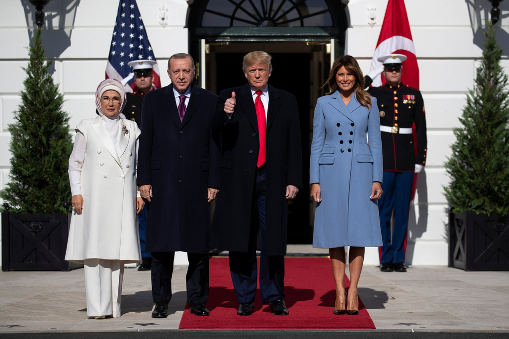 FILE - President Donald Trump and first lady Melania Trump welcome Turkish President Recep Tayyip Erdogan and his wife Emine Erdogan to the White House, Nov. 13, 2019, in Washington. (AP Photo/ Evan Vucci, File)