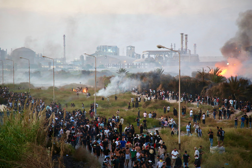 People protest and clash with police during a demonstration against pollution caused by chemical factories, in Gabes, Tunisia, Wednesday, Oct. 16, 2025. (AP Photo/Bassem Aouini) People protest and clash with police during a demonstration against pollution caused by chemical factories, in Gabes, Tunisia, Wednesday, Oct. 16, 2025. (AP Photo/Bassem Aouini)