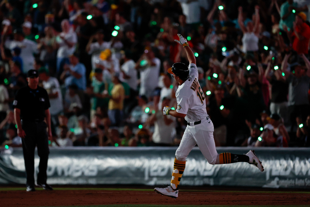 Athletics' Nick Kurtz (16) rounds the bases after hitting a solo home run during the fifth inning of a baseball game against the Colorado Rockies, Friday, June 12, 2026, in Las Vegas. (AP Photo/Caroline Brehman)