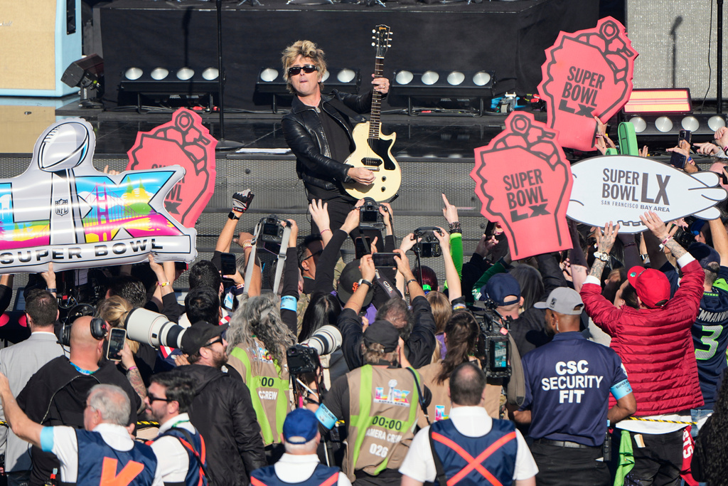 Billie Joe Armstrong of Green Day performs before the NFL Super Bowl 60 football game between the Seattle Seahawks and New England Patriots, Sunday, Feb. 8, 2026, in Santa Clara, Calif. (AP Photo/Charlie Riedel)