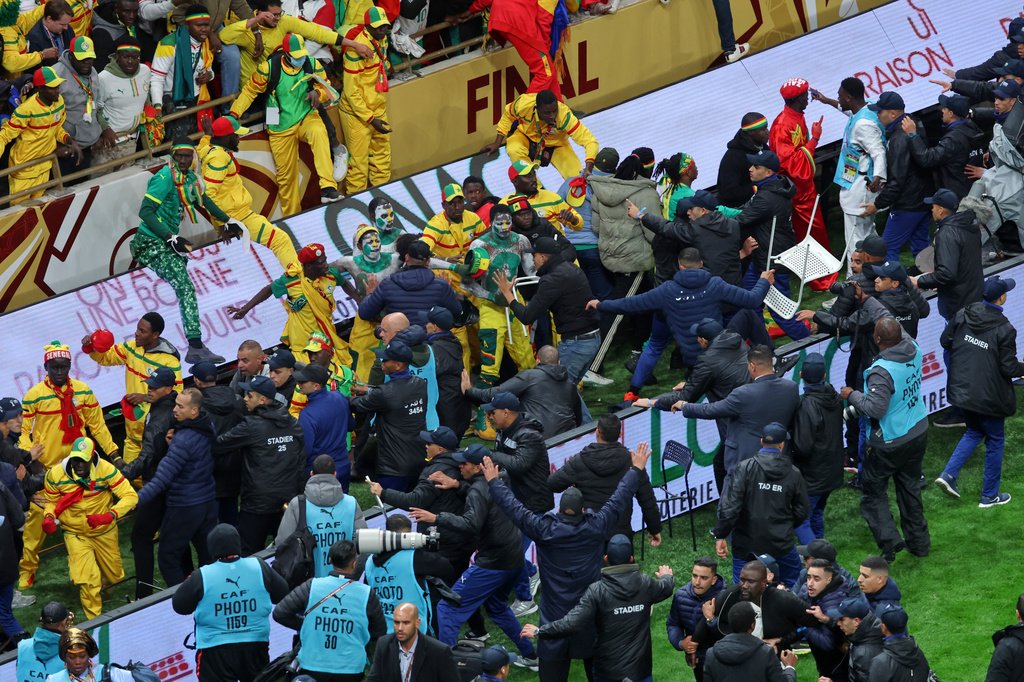 FILE - Senegal supporters clash with security services after a controversial penalty was awarded to Morocco late on during the Africa Cup of Nations final soccer match between Senegal and Morocco in Rabat, Morocco, Jan. 18, 2026. (AP Photo/Youssef Loulidi, File)