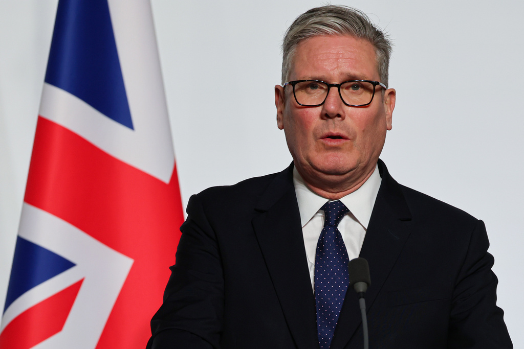 Britain's Prime Minister Keir Starmer delivers a speech upon the signing of the declaration on deploying post-ceasefire force in Ukraine during the 'Coalition of the Willing' summit on security guarantees for Ukraine, at the Elysee Palace in Paris Tuesday, Jan 6, 2026. (Ludovic Marin, Pool photo via AP)