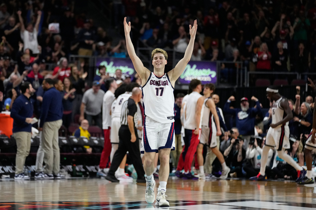 Gonzaga guard Mario Saint-Supery (17) celebrates after a play against Santa Clara during the second half of an NCAA college basketball final game in the West Coast Conference men's tournament Tuesday, March 10, 2026, in Las Vegas. (AP Photo/John Locher)