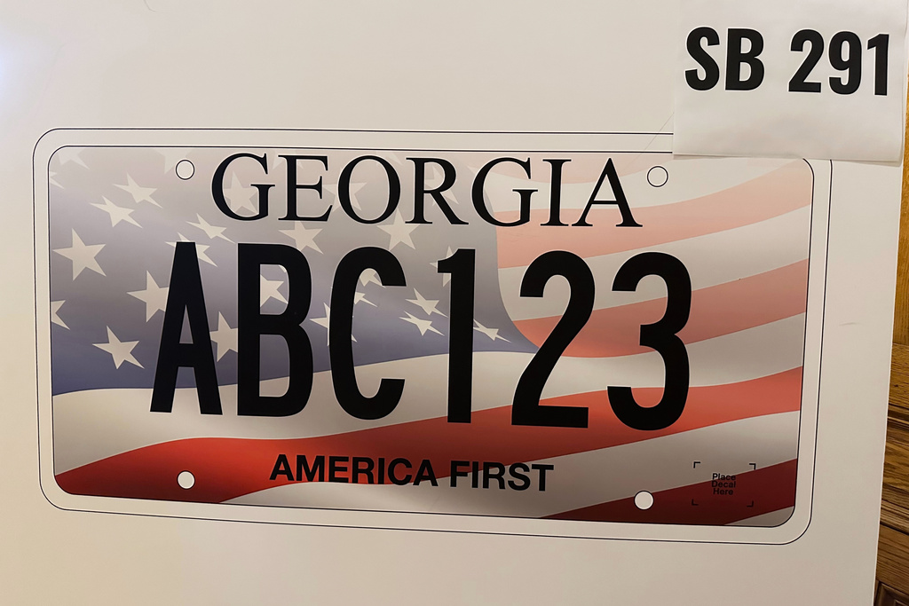 A rendering of Georgia's new America First license plate, which becomes available Jan. 1, 2026, is shown at the Georgia Capitol, in Atlanta, April 2, 2025. (AP Photo/Jeff Amy)