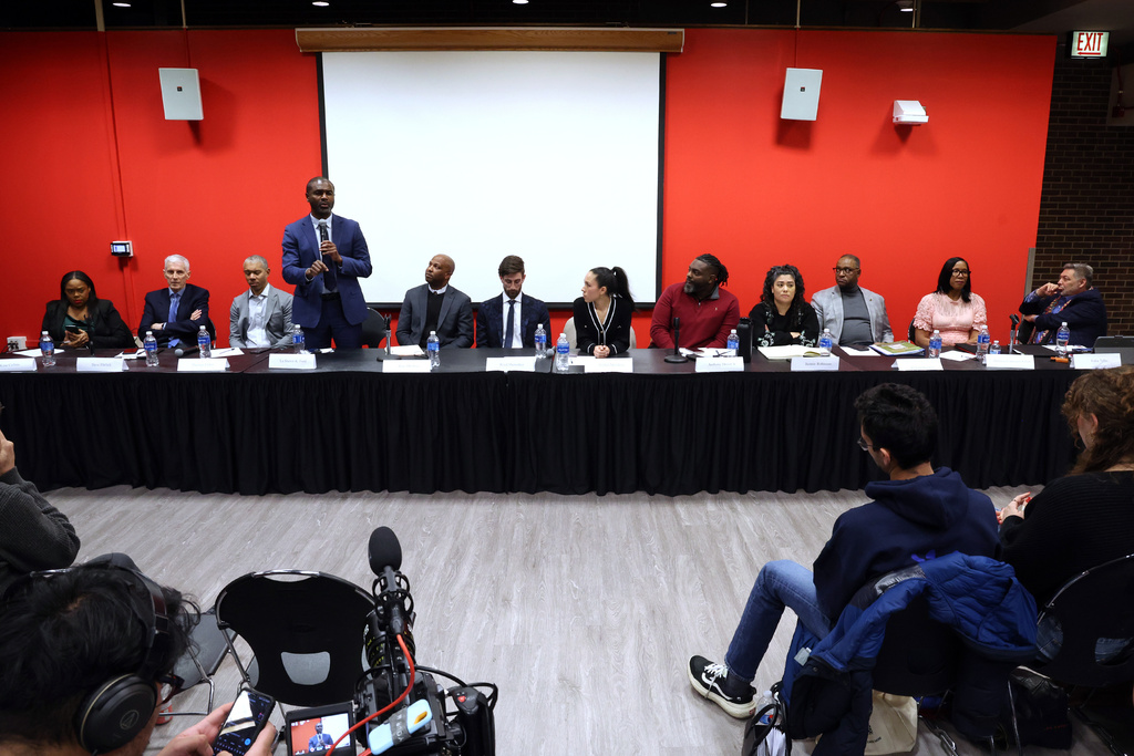 Candidates for the Illinois 7th Congressional District seat, from left, Kina Collins, David Ehrlich, Dr. Thomas Fisher, La Shawn K. Ford, Rory Hoskins, Reed Showalter, Anabel Mendoza, Anthony Driver Jr., Jazmin J. Robinson, Richard Boykin, Melissa Conyears-Ervin and Felix Tello attend a public forum at the University of Illinois Chicago Friday, Feb 20, 2026, in Chicago. (Terrence Antonio James/Chicago Tribune via AP)