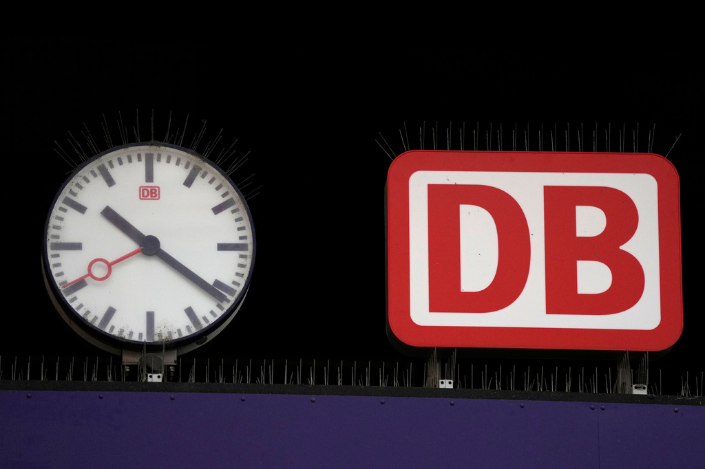 FILE - The logo of Deutsche Bahn is pictured at the central station in Munich, Germany, Jan. 24, 2024. (AP Photo/Matthias Schrader, file)