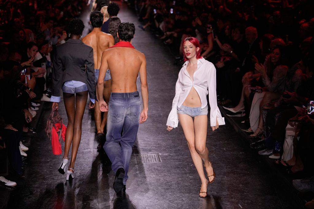 Models wear creations part of the Diesel women's Spring-Summer 2027 collection presented in Milan, Italy, Tuesday, Sept. 22, 2026. (AP Photo/Luca Bruno).