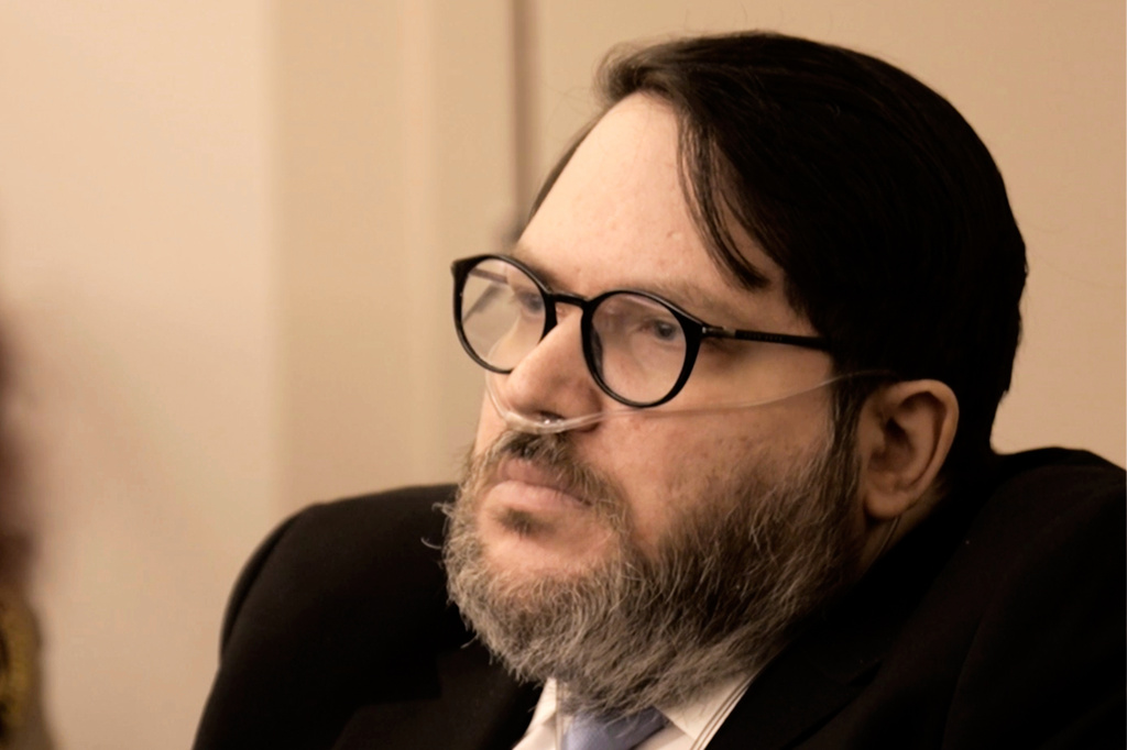 FILE - In this image made from pool video footage, Nicholas Rossi, accused of faking his death and fleeing to Europe to avoid rape charges, appears at a jury trial in Salt Lake City, Aug. 11, 2025. (Firecrest Films via AP, Pool, File)