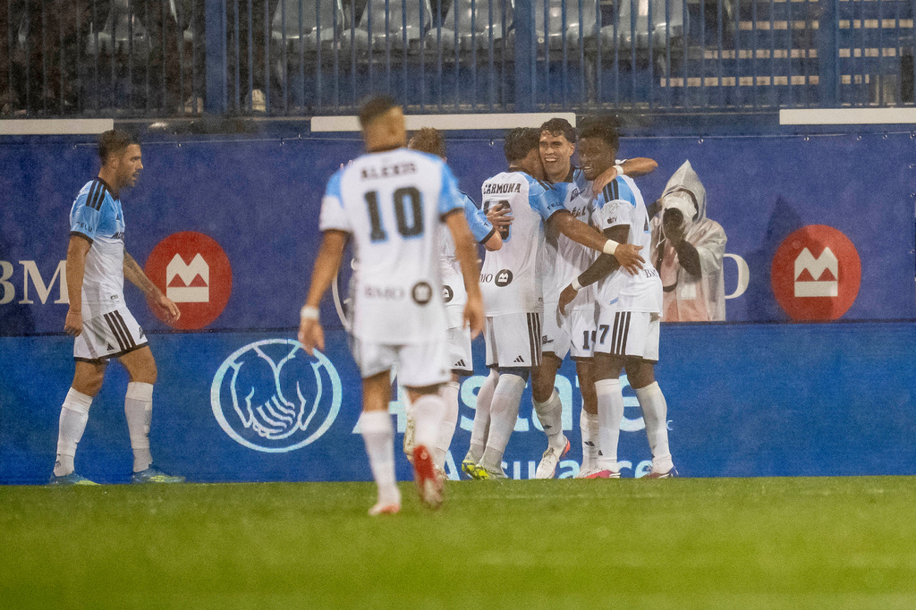 CF Montreal's Daniel Rios (second right) celebrates with teammates after scoring during first half of a MLS soccer game against Charlotte FC, in Montreal, Wednesday, Sept. 9, 2026. (Christopher Katsarov/The Canadian Press via AP)