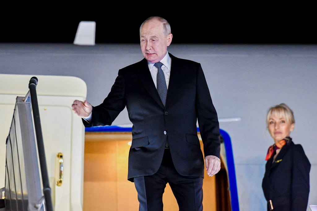 Russian President Vladimir Putin waves as he arrives for the BRICS Summit in New Delhi, India, Friday, Sept. 11, 2026. (Indian Foreign Ministry via AP)