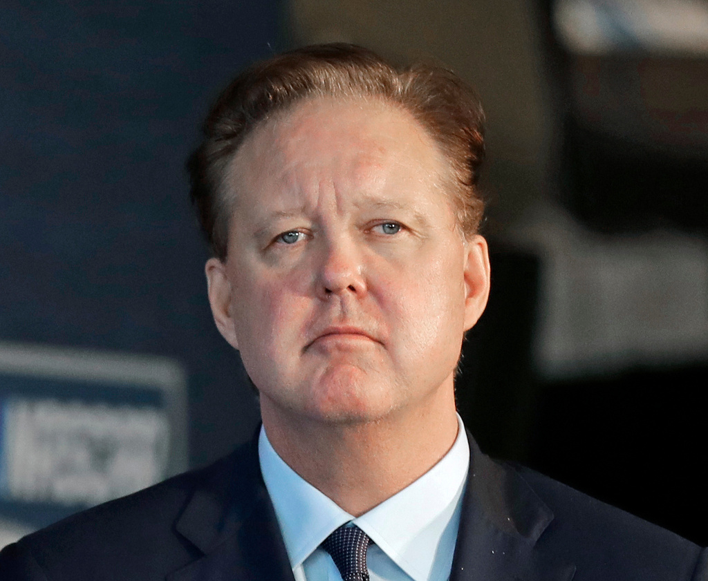 FILE - In this May 23, 2018, file photo, NASCAR Chairman Brian France watches a video of driver Jeff Gordon after announcing that Gordon will be inducted into the 2019 class of the NASCAR Hall of Fame, in Charlotte, N.C. (AP Photo/Chuck Burton, File)