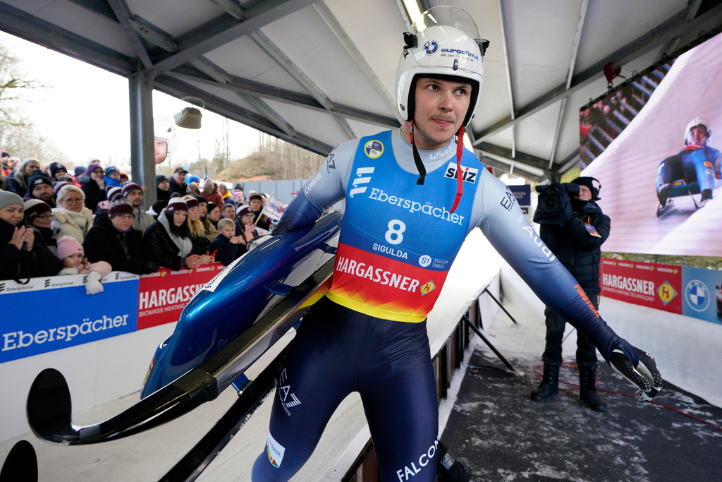 FILE - Dominik Fischnaller of Italy reacts after his second run of the men's race of the Luge World Cup in Sigulda, Latvia, Sunday, Feb. 25, 2024. (AP Photo/Roman Koksarov, File)