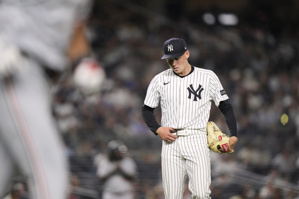 New York Yankees pitcher Will Warren reacts as Minnesota Twins' Trevor Larnach runs the bases after hitting a home run during the seventh inning of a baseball game Monday, Aug. 11, 2025, in New York. (AP Photo/Frank Franklin II)